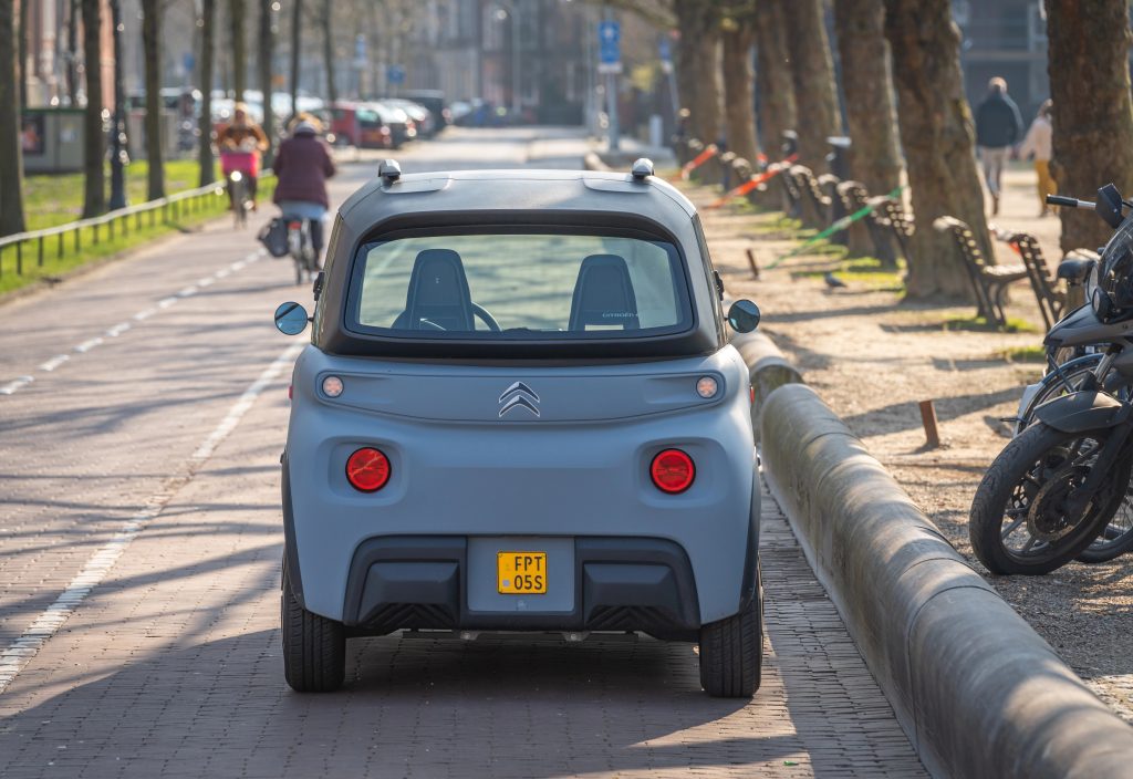 Amsterdam, The Netherlands, 08.03.2024, Compact electric quadricycle Citron Ami in the street