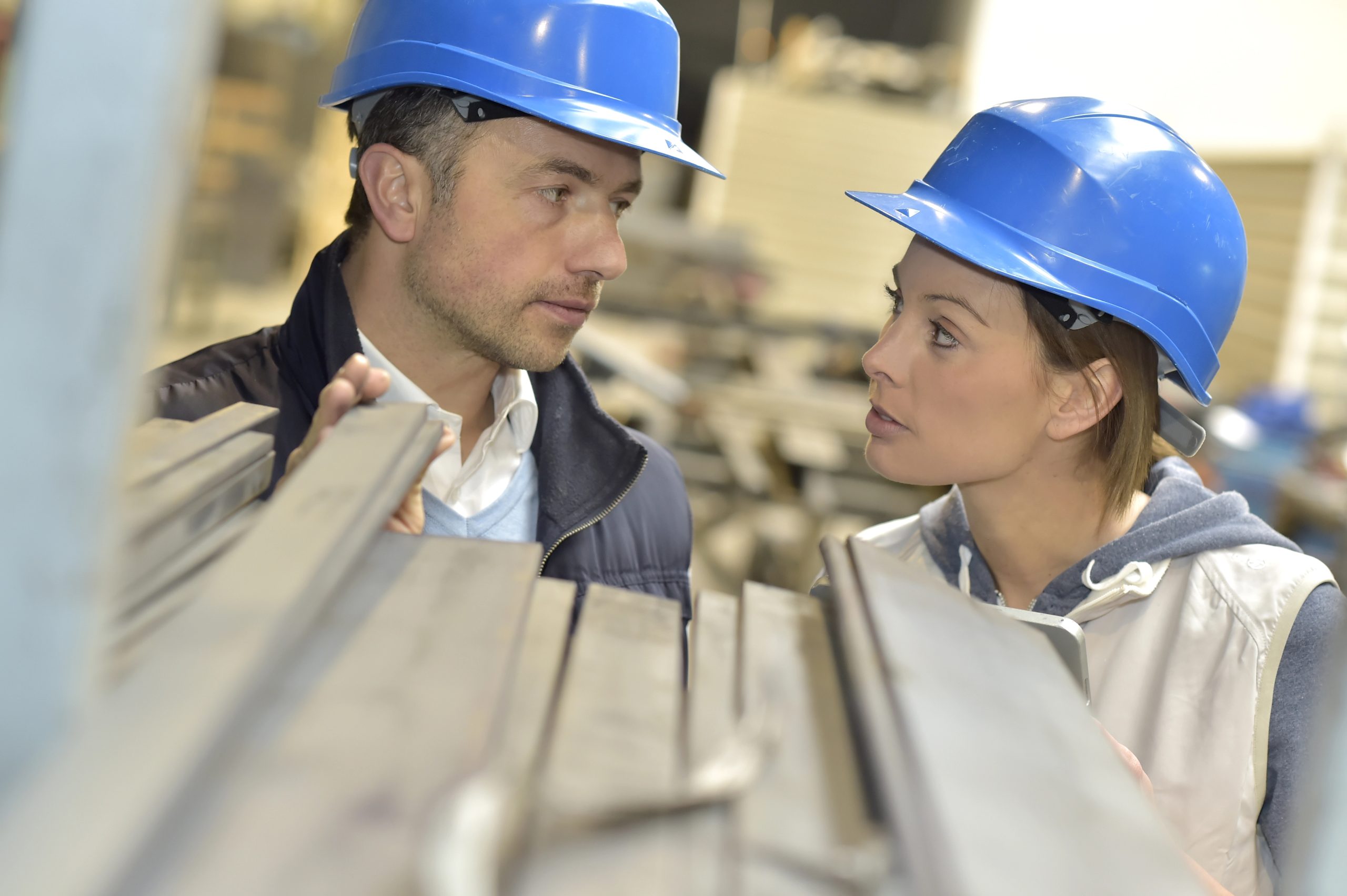 Supplier with engineer checking on production